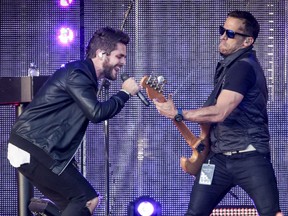 Thomas Rhett, left, with lead guitarist Eric Borash, at RBC Ottawa Bluesfest on Sunday, July 10, 2016.