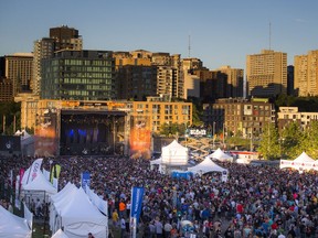 The sun sets on the crowd at Bluesfest Sunday July 10, 2016.