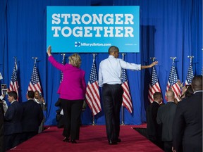 President Barack Obama and Democratic presidential candidate Hillary Clinton leave a campaign event in Charlotte, North Carolina, on July 5, 2016.