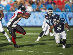 Toronto Argonauts Jermaine Gabriel and Ottawa Redblacks Nic Grigsby during CFL action at BMO Field in Toronto, Ont. on Wednesday July 13, 2016.