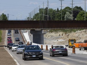 Two lanes of Greenbank Road that run beneath the Via Rail overpass opened to traffic on Friday July 22, 2016. Two additional lanes will open in the fall.