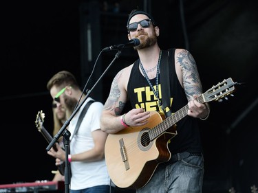 Ty Hall from the band Ty Hall and Co. performs at the 34th edition of Hope Volleyball Summerfest.