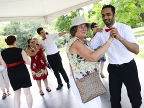 Visitors attending The Estate in Bloom event over the long weekend at Mackenzie King Estate participate in a swing dance workshop on Sunday, July 31, 2016.