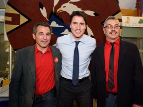 Nunavut's Hunter Tootoo (left), then a candidate for office, is shown with Liberal party leader Justin Trudeau and NWT Liberal candidate Michael McLeod in Yellowknife during a pre-election tour of the North last October. Tootoo won his seat.