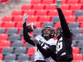WR Monte Green-Avery (L) and DB Imoan Claiborne go up for a ball during the final day of the Ottawa REDBLACKS  mini camp at TD Place on Tuesday April 26, 2016. Errol McGihon