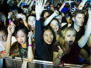 Young fans go crazy for Madeon performing on the Blacksheep Stage at Bluesfest Sunday July 10, 2016.