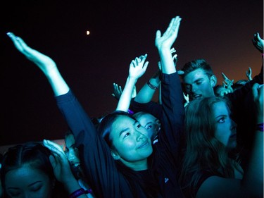 Young fans go crazy for Madeon performing on the Blacksheep Stage at Bluesfest Sunday July 10, 2016.   Ashley Fraser/Postmedia