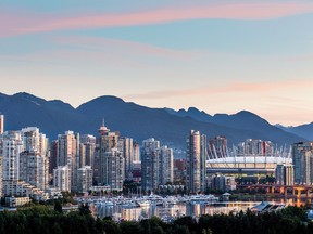 Vancouver skyline at sunrise is shown in a handout photo. THE CANADIAN PRESS/HO-Destination BC-Albert Normandin