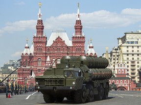 Russian S-400 air defense missile systems drive during the Victory Day military parade marking 71 years after the victory in WWII in Red Square in Moscow, Russia, Monday, May 9, 2016.  In the back is the State Historical Museum. (AP Photo/Pavel Golovkin) ORG XMIT: MOSB126