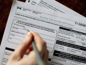 The T1 General 2010 form is pictured in Toronto on April 13, 2011. Fear of making mistakes and missing deductions can trip up Canadians who are doing their own income taxes, say tax experts. THE CANADIAN PRESS/Chris Young ORG XMIT: CPT118