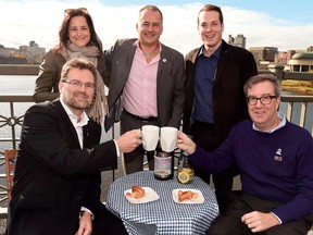 Gatineau Mayor Maxime Pedneaud-Jobin (left) and Ottawa Mayor Jim Watson (right) joined members of the Ottawa 2017 team on the Alexandra Bridge last fall to announce the July 2, 2017 Interprovincial Picnic on the Bridge.