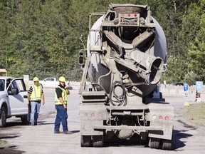 A concrete mixing truck enters Lafarge Canada at 1649 Bearbrook Rd. where it's reported a man was killed after falling into a cement truck Monday, Aug. 8, 2016.