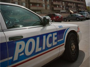 An Ottawa Police car sits outside an apartment at 380 Murray Street where they are investigating a suspicious death. May 5,2009