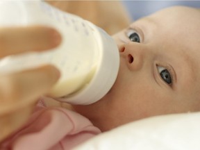 Baby with bottle.