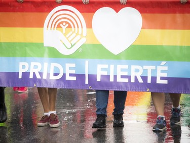 Capital Pride's 2016 parade brought thousands out to show support for Ottawa's LGBTTQ despite the wet weather August 21, 2016.   Ashley Fraser/Postmedia