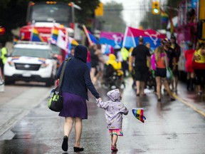 Capital Pride's 2016 parade brought thousands out to show support for Ottawa's LGBTTQ despite the wet weather August 21, 2016.   Ashley Fraser/Postmedia