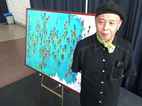 Chi Wei Lee, 54, found the confidence and inspiration to paint while in an Ottawa shelter. Each key in his painting, which will hang inside Ottawa City Hall, represents the dignity people gain when they have their own home, he says.