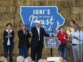 DES MOINES, IA - AUGUST 27: Kim Reynolds, Lieutenant Governor (R-IA), Left, Terry Branstad, Governor (R-IA), Republican presidential nominee Donald Trump, Sen. Joni Ernst (R-IA), Jeff Kaufmann, Republican Party of Iowa Chairman, and Rep. Steve King (R-IA) on stage at the 2nd annual Joni Ernst Roast and Ride event on August 27, 2016 in Des Moines, Iowa. Trump joined a number of Iowa Republicans speaking to a crowd of supporters.
