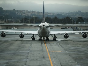 SAN FRANCISCO, CA - JUNE 10: A United Airlines plane sits on the tarmac at San Francisco International Airport on June 10, 2015 in San Francisco, California. The Canadian Federal Pilots Association is questioning safety regimes surrounding airlines in Canada.