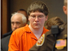 FILE - In this Aug. 2, 2007 file photo, Brendan Dassey is escorted into court for his sentencing in Manitowoc, Wis. The Netflix documentary series "Making a Murderer" tells the story of a Wisconsin man wrongly convicted of sexual assault.