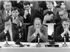 Nov. 5, 1981: The lack of sleep shows on the faces of Prime Minister Pierre Trudeau (C) Justice Minister Jean Chrétien (L) and Finance Minister John MacEachen during constitutional negotiations.