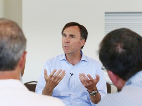 Federal Finance Minister Bill Morneau takes part in a Facebook live town hall session at the Northern Water Sports Centre in Sudbury, Ont. on Tuesday August 9, 2016. John Lappa/Sudbury Star/Postmedia Network