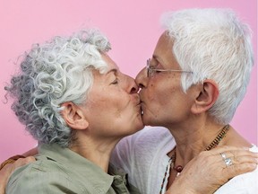 A couple photographed by Adam Zivo as part of the #LOVEISLOVEISLOVE project.