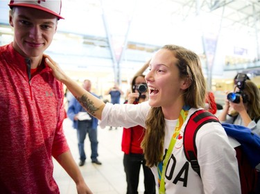 Gatineau's Bronze medalist Natasha Watcham-Roy was welcomed home with her boyfriend Nils Pavey and friends, family and supporters at the Ottawa Macdonald–Cartier International Airport Tuesday August 23, 2016.