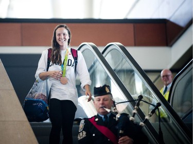 Gatineau's bronze medalist Natasha Watcham-Roy was welcomed home by friends and family at the Ottawa Macdonald–Cartier International Airport Tuesday August 23, 2016.