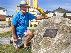Gilles Lamadeleine shows the rock that honours his father, Omer, in Omer Lamadeleine Park in Embrun. Omer was among the nine workers who died as a result of the Heron Road Bridge collapse on Aug. 10, 1966.