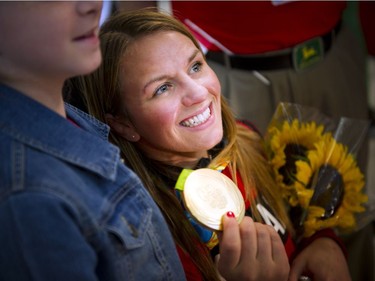 Gold medalist Erica Wiebe was greeted by family, friends and supporters after returning from the Olympics in Rio to the Ottawa Macdonald–Cartier International Airport Tuesday August 23, 2016.