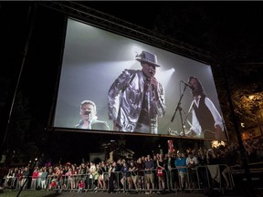 The Tragically Hip's frontman Gord Downie is displayed on a screen during a public viewing of the band's final concert of the "Man Machine Poem" tour in Halifax on Saturday, August 20, 2016.