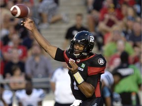 Ottawa Redblacks' quarterback Henry Burris (1) makes a throw during first half CFL action against the Toronto Argonauts, in Ottawa on Sunday, July 31, 2016.