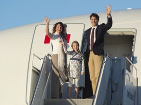 Prime Minister Justin Trudeau, seen here with wife Sophie and daughter Ella-Grace, departed on his first official trip to China on Monday.