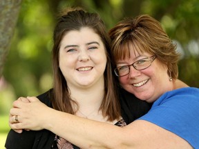 Kathleen Hanna, pictured with her mom, Julie, at their Kinburn home, underwent a double lung transplant in April and is already biking and kayaking.