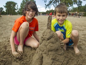 Maria and Matthew Scarvelis, 10 and 5, at  Mooney's Bay Beach.