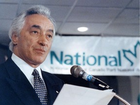 National party leader Mel Hurtig speaks to loyal followers at a post election party in Edmonton on Oct. 25, 1993. A published report says Mel Hurtig, the ardent nationalist behind "The Canadian Encyclopedia", has died.