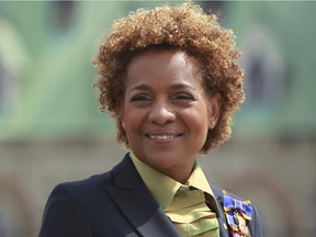 Michaelle Jean, Governor General of Canada is all smiles as she looks over troops during her annual Inspection of the Ceremonial Guard at Parliament Hill Tuesday in Ottawa June 22, 2010. Michaelle Jean will become a special UNESCO envoy focussing on Haiti relief.