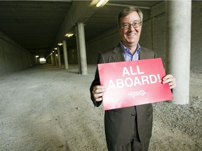 Ottawa Mayor Jim Watson shares his sentiments while standing in a future LRT tunnel at Algonquin College, in this 2015 file photo.