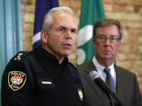 Ottawa Police Chief Charles Bordeleau speaks during a press conference after meeting with Mayor Jim Watson, Ottawa Centre MPP Yasir Naqvi, Coun. Eli El-Chantiry--who chairs the police services board--and Ken Bryden--Acting Staff Sergeant of the Ottawa Police Guns and Gang Unit--on Monday evening, Jan. 12, 2015. The meeting was held to address the spike in gang-related shootings in Ottawa.