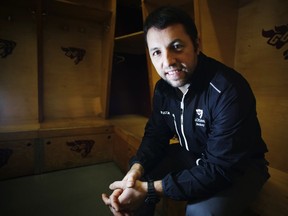 Patrick Grandmaitre, the new head coach of the University of Ottawa men's hockey team, is photographed in the dressing room Monday January 11, 2016.