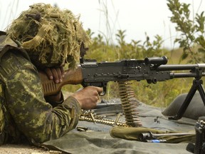 A Canadian Army reservist fires a burst from a C6 machinegun. Photo courtesy DND.