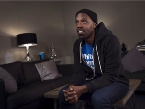 Shad, recently replaced as host of CBC Radio's "Q," poses at the CBC headquarters in Toronto on Thursday, March 12, 2015.