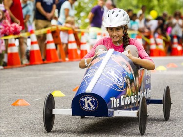 Aziza Toubeh pilots her soapbox down Beaverwood Road.