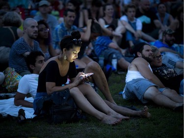 The Tragically Hip's final concert that took place in Kingston was projected in Parkdale Park for a large crowd of fans, including Kelsey Rideout.