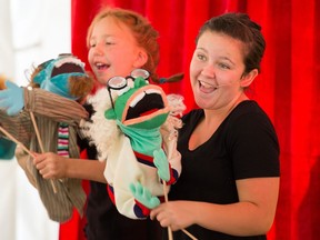 Xena Santry, 13, right, and Abigail Gray, 10, of the Almonte High School theatre group perform as the annual Puppets Up! International Puppet Festival takes place in Almonte.