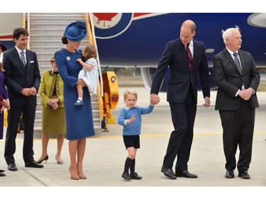 VICTORIA, BC - SEPTEMBER 24:  The Prime Minister of Canada Justin Trudeau (L) watches after greeting Prince William, Duke of Cambridge, Catherine, Duchess of Cambridge, Prince George of Cambridge and Princess Charlotte of Cambridge arrive at Victoria International Airport on September 24, 2016 in Victoria, Canada.