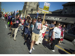 A large crowd turned out to march in the annual Ottawa Labour Day Parade to celebrate working people Monday September 5, 2016.