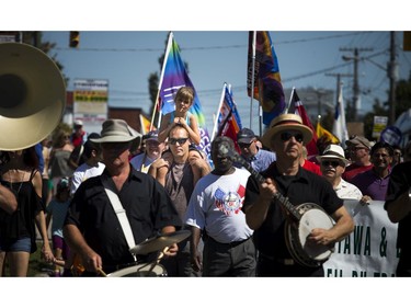 A large crowd turned out to march in the annual Ottawa Labour Day Parade to celebrate working people Monday September 5, 2016.