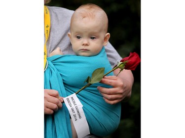 - A woman holds a rose for Nicole Guimond while cradling her young son. When she was pregnant with him, she was living in a women's shelter.  About 40 people came out for the Lanark Take Back the Night March Wednesday (Sept. 21, 2016) in Carleton Place.  Although the event is primarily focused on violence against women, amongst the speakers was Catherine Cameron, whose husband and former councillor, Bernard Cameron, was killed in February by their daughter's ex partner.  Before the march, 19 roses (including one for Bernard) were dropped into the Mississippi River in honour of women who had been killed in the area, including the three women murdered near Wilno last year on Sept. 22, 2015. Julie Oliver/Postmedia